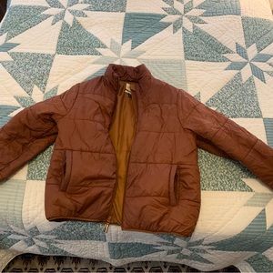 target universal thread rust orange puffer cropped